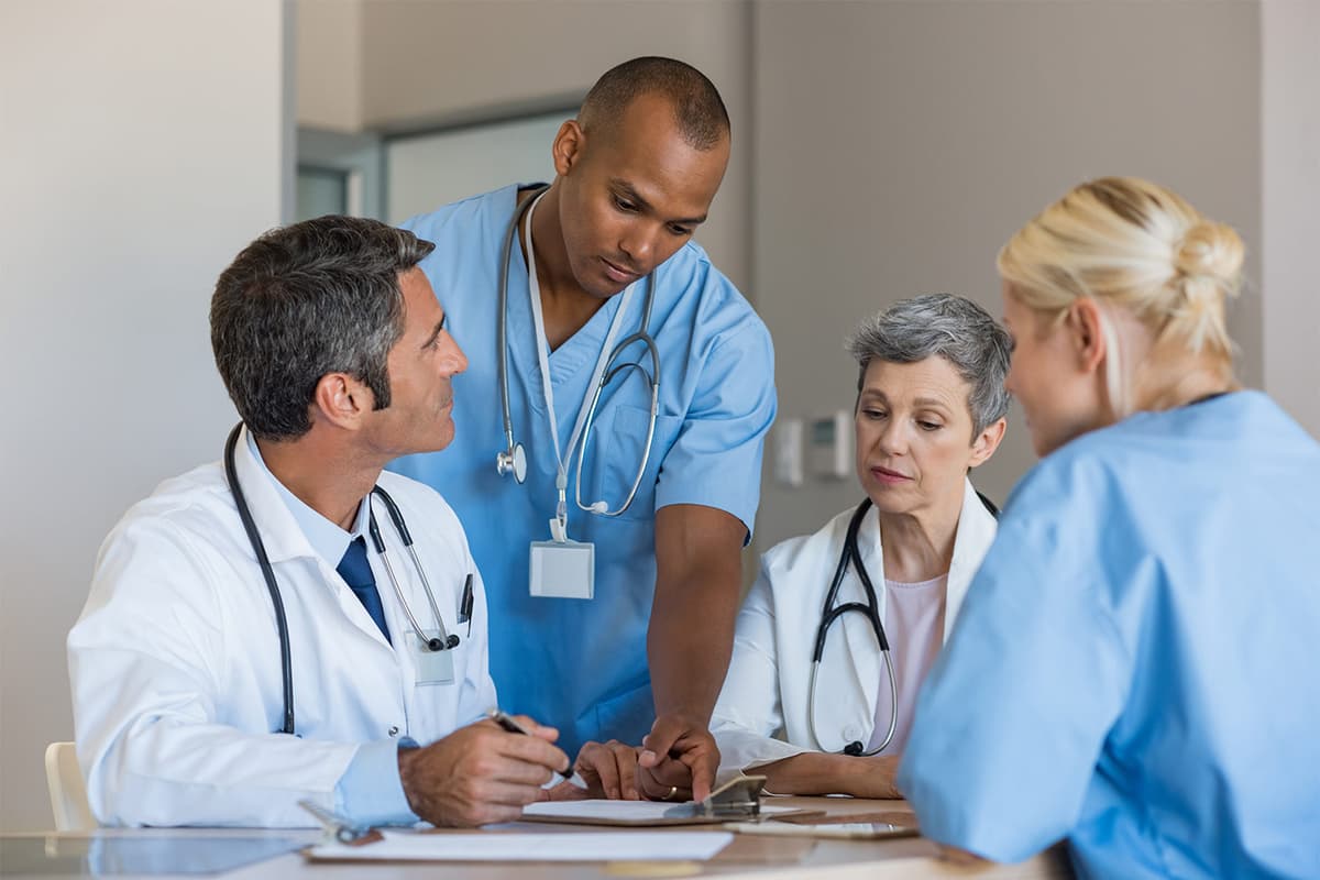 Doctors discussing medical questions